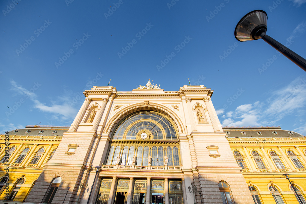 View on the fasade of eastern railway station during the sunset in Budapest city, Hungary