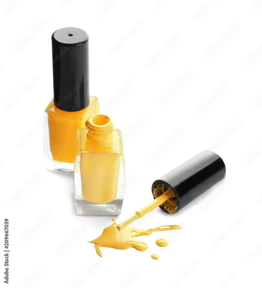 Bottles of nail polish on white background