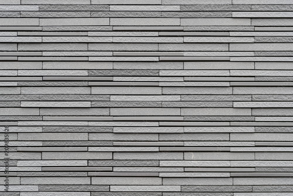 Modern grey stone wall pattern and background