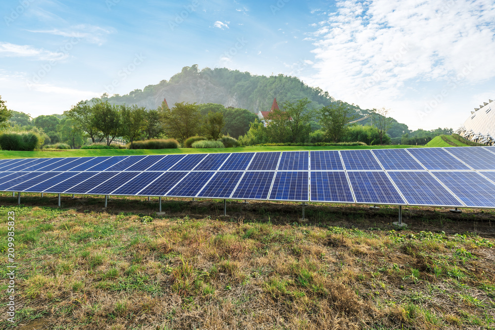 Solar panels and mountains landscape