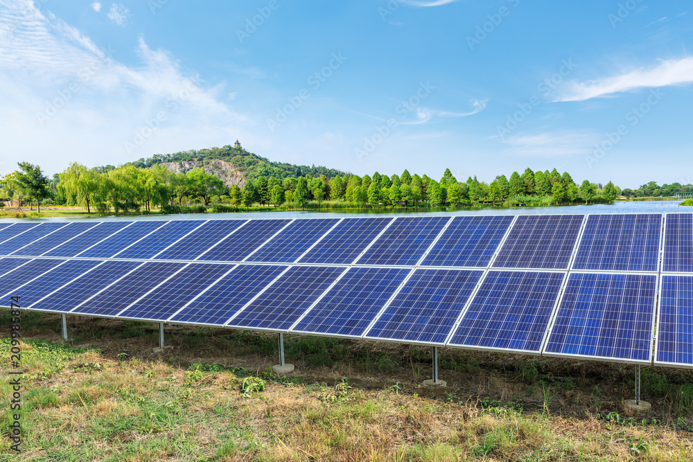 Solar panels and mountains landscape