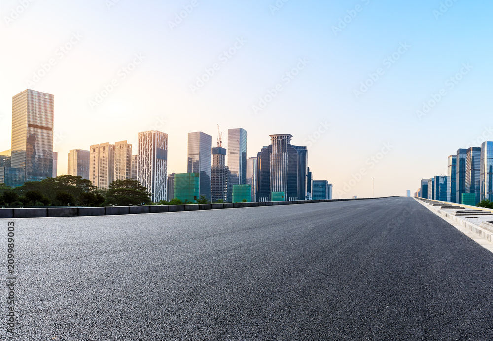 Empty asphalt road and modern city skyline in Shenzhen,China