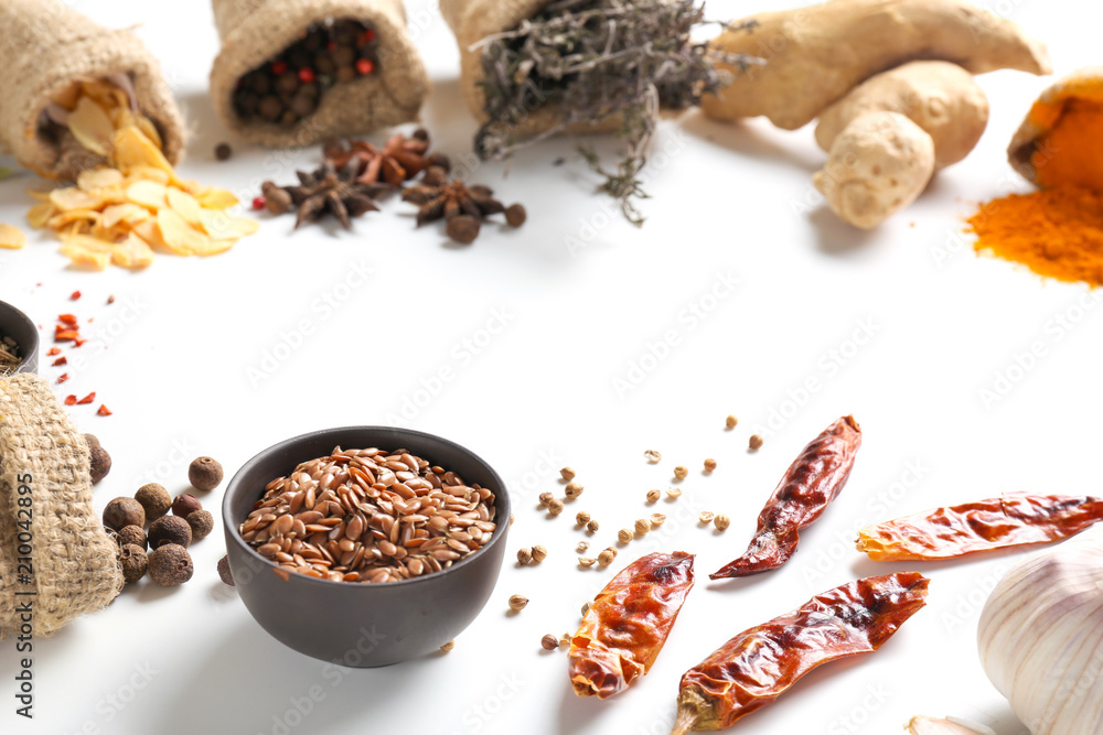 Composition with various spices on white background