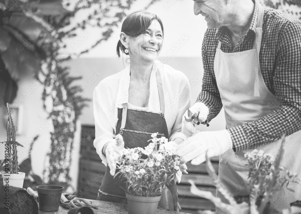 People planting flowers in the garden