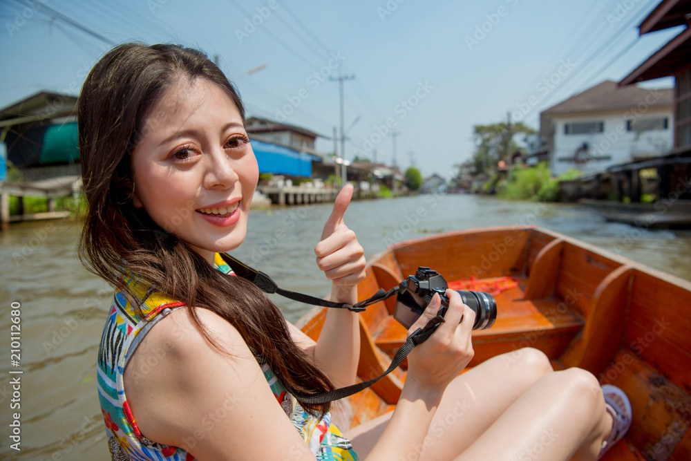 Traveler taking pictures on the floating market