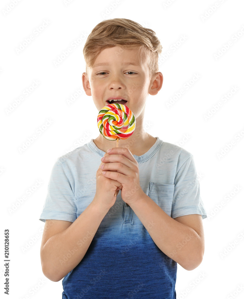 Cute little boy with lollipop on white background