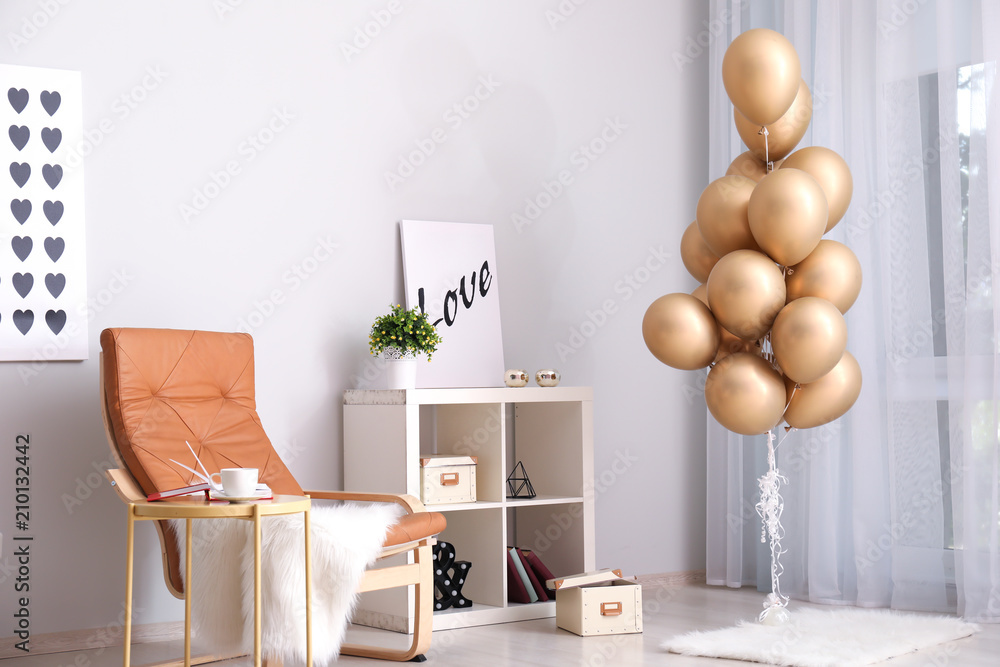 Elegant interior of living room with air balloons