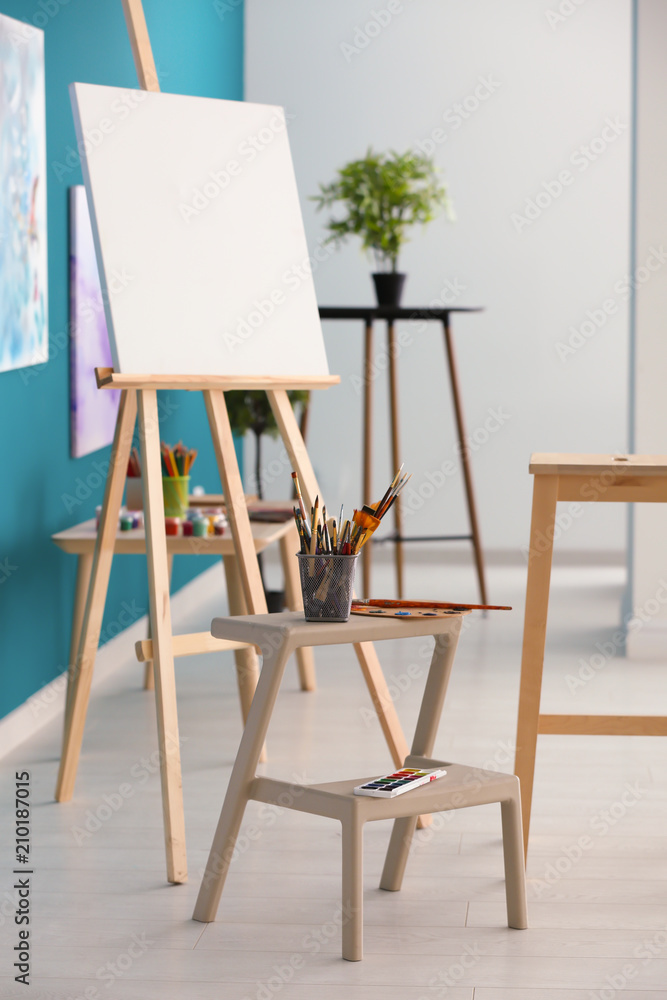 Interior of artists workshop with canvas