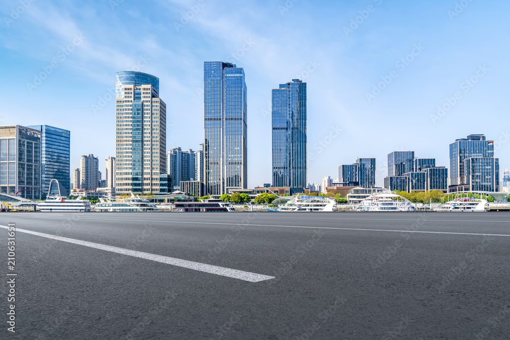 Air highway asphalt road and office building of commercial building in modern city