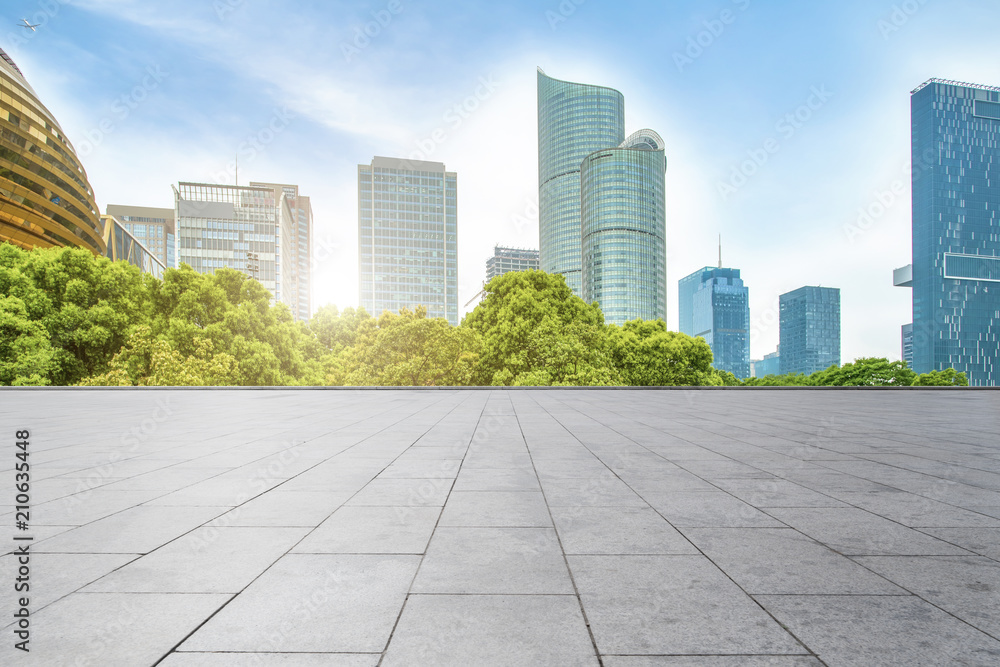 Urban skyscrapers with empty square floor tiles