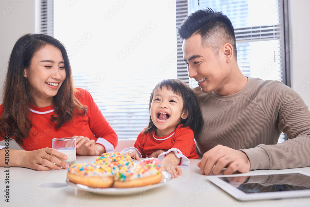 happy family has breakfast in the morning