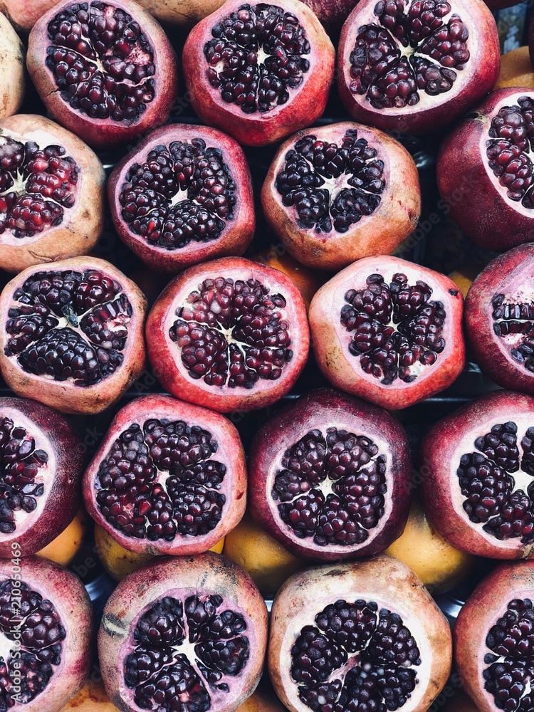 Pomegranates fruit for making fresh squized juice in the street of Istanbul, Turkey. Traditional str