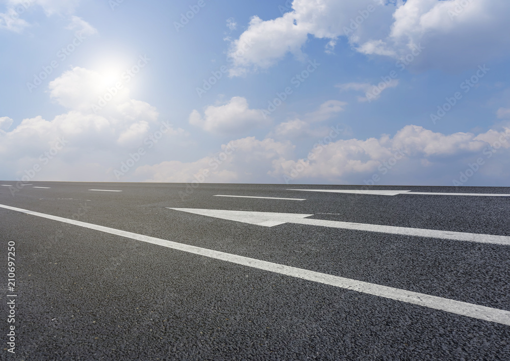 asphalt highway road under the blue sky