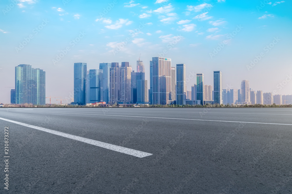 Air highway asphalt road and office building of commercial building in modern city