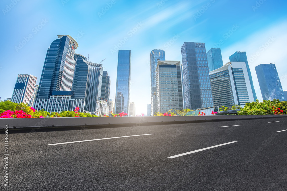 empty road with panoramic cityscape