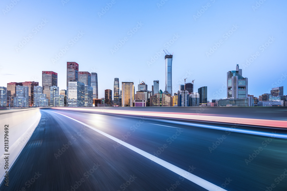 empty asphalt road with modern building in urban