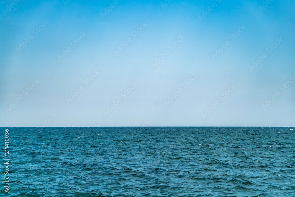 Horizon of the sea. Blue water and sky