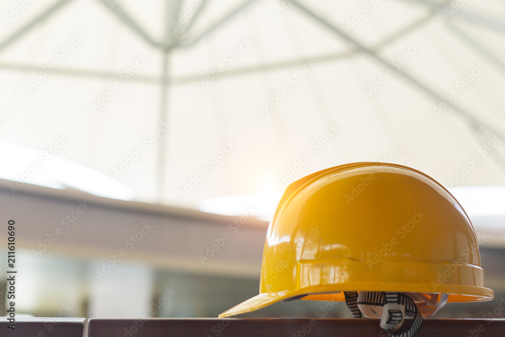 helmet in construction site and construction site worker background safety first concept