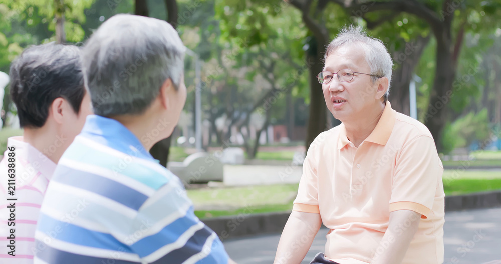 old people chatting happily