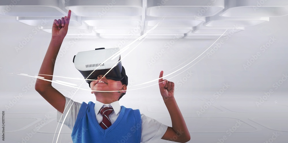 Schoolboy wearing virtual reality headset enjoying