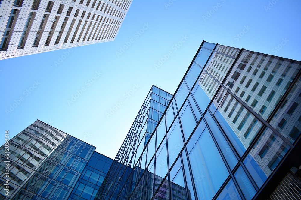 Blue clean glass wall of modern skyscraper