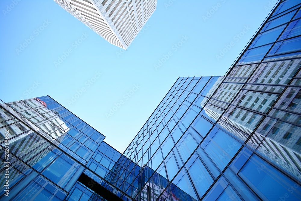 Blue clean glass wall of modern skyscraper