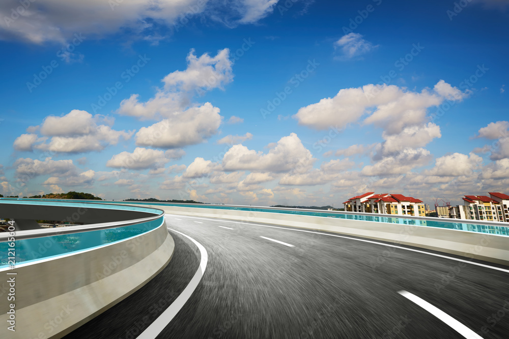 Highway overpass motion blur with beautiful day .