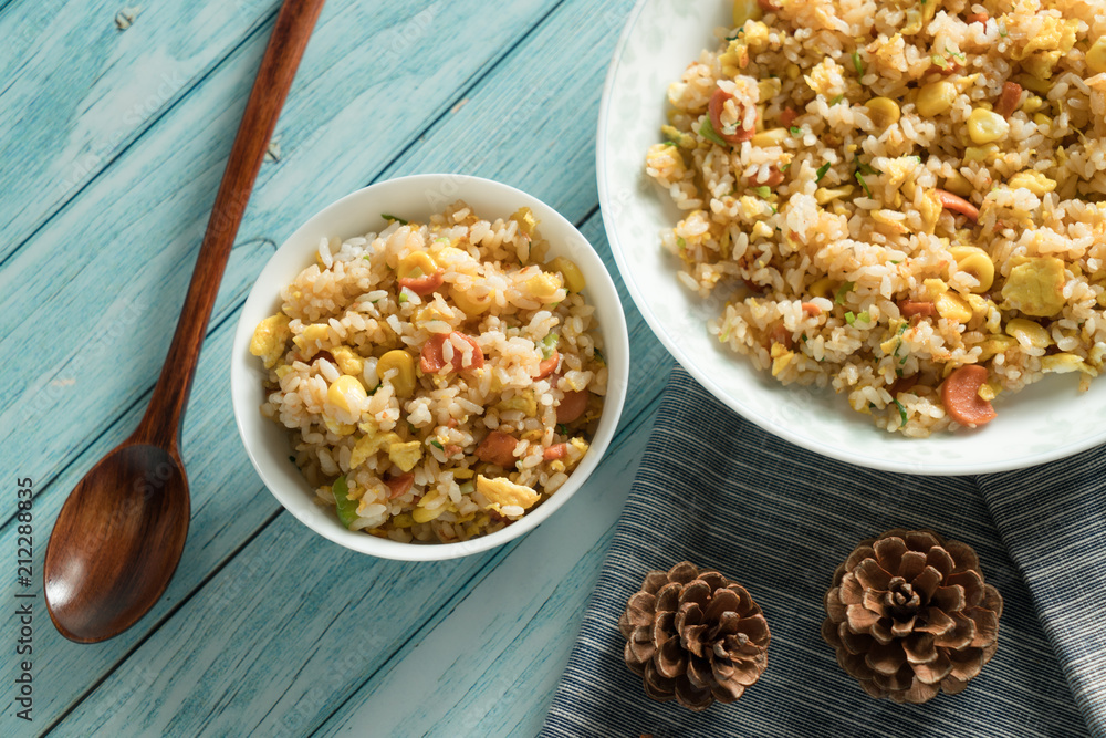 Egg Fried rice with a blue wood grain background