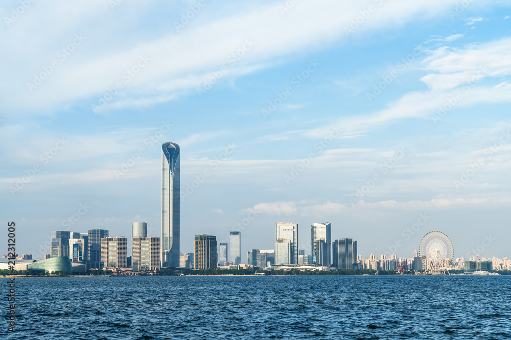 city building along lakeside