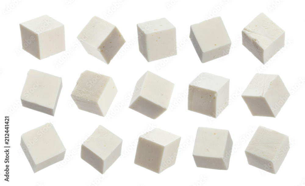 Greek feta cubes. Diced soft cheese isolated on white background