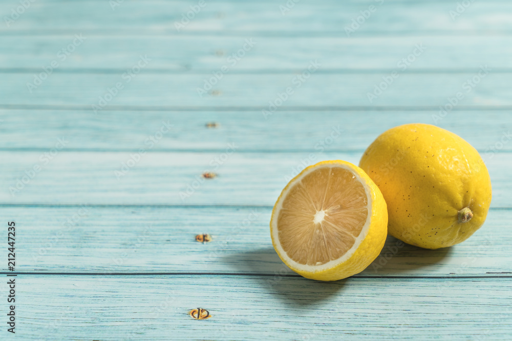 Lemon and cyan wood background