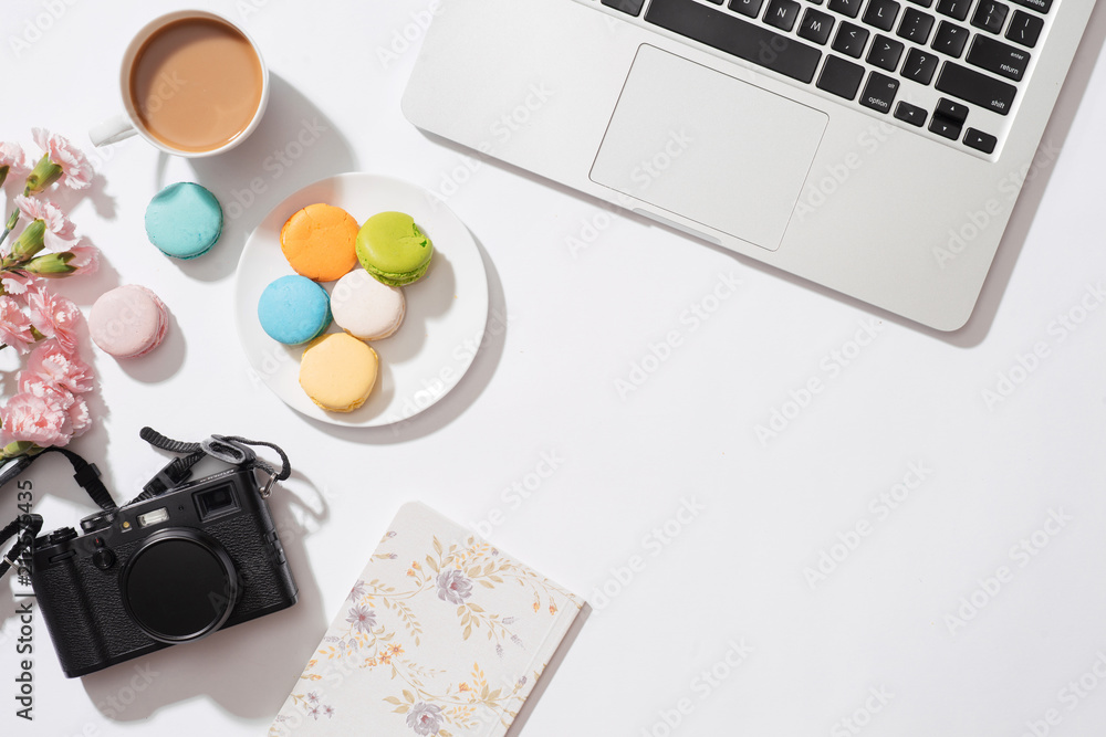 Cozy morning breakfast with pastel colorful macarons or macaroons.