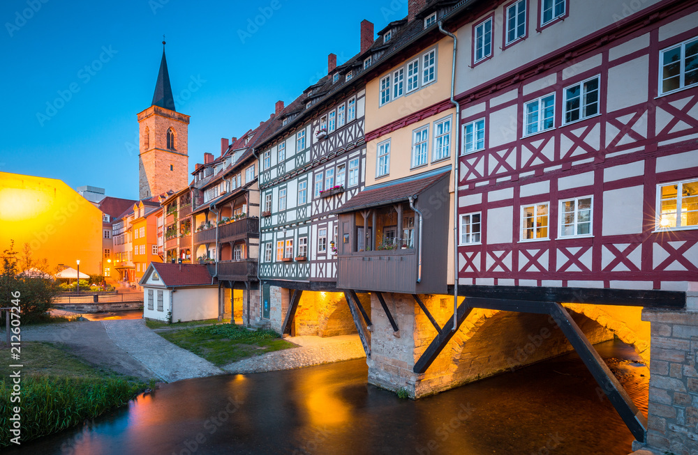 Historic city center of Erfurt with Krämerbrücke bridge illuminated at twilight, Thüringen, Germany