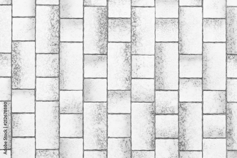 Modern white stone tile wall pattern and background