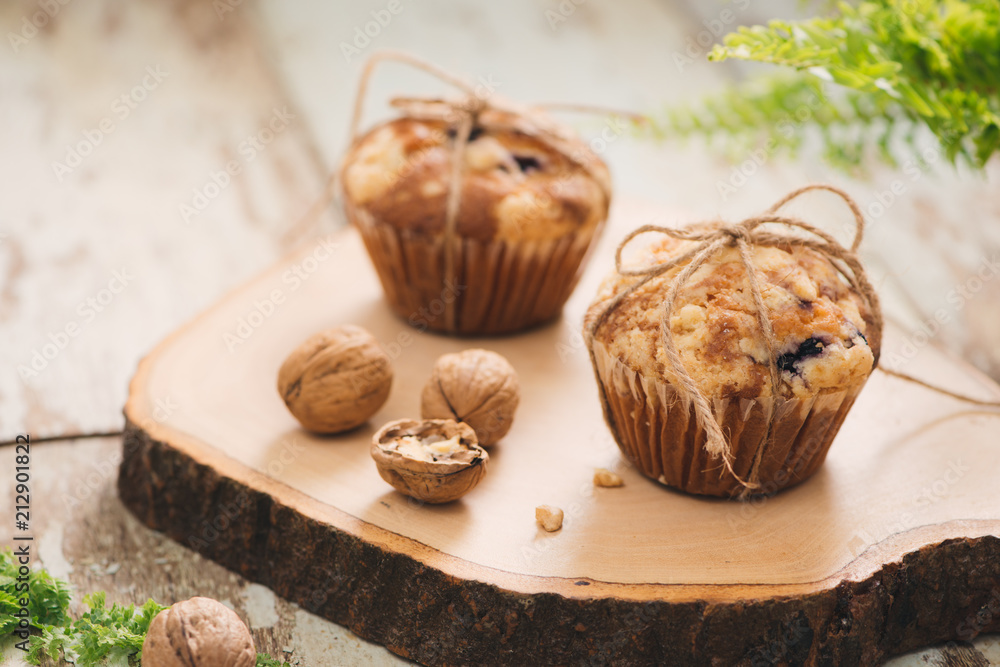 Dellicious homemade nut muffins on table. Sweet pastries