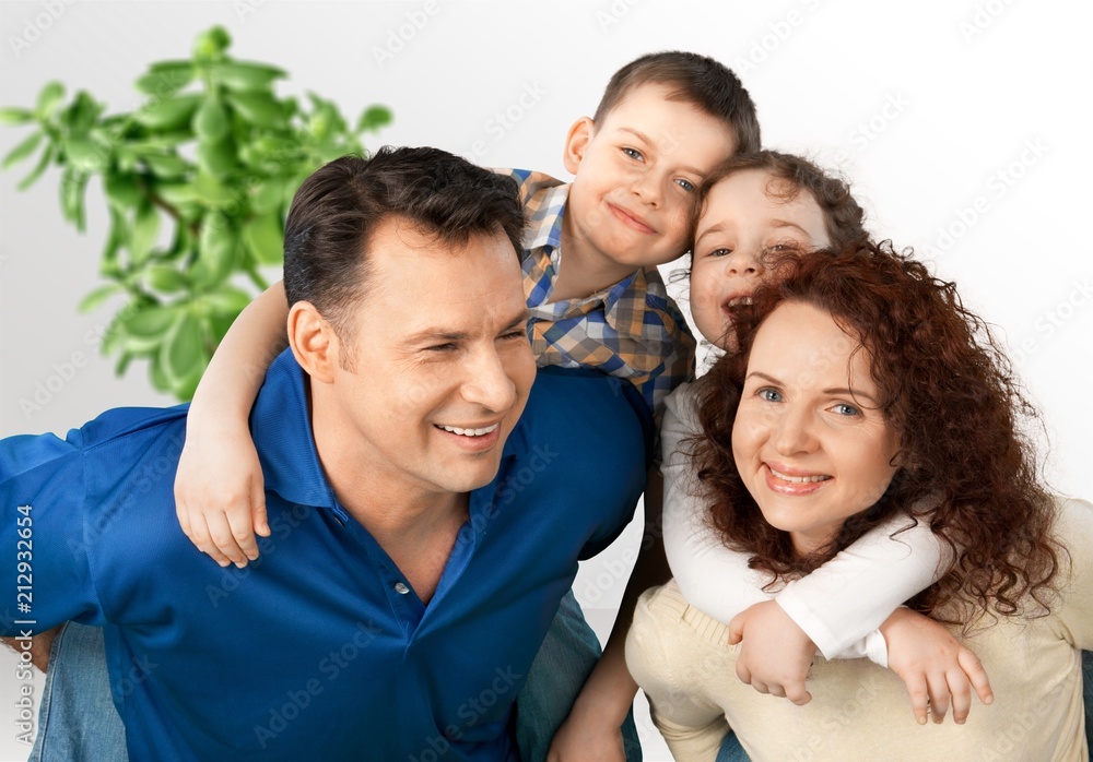 Beautiful smiling family in room