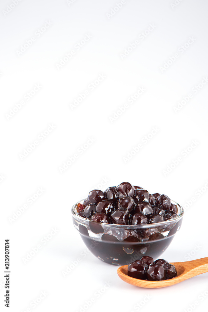  black pearls. Boiled tapioca pearls for bubble tea on white background. Copy space