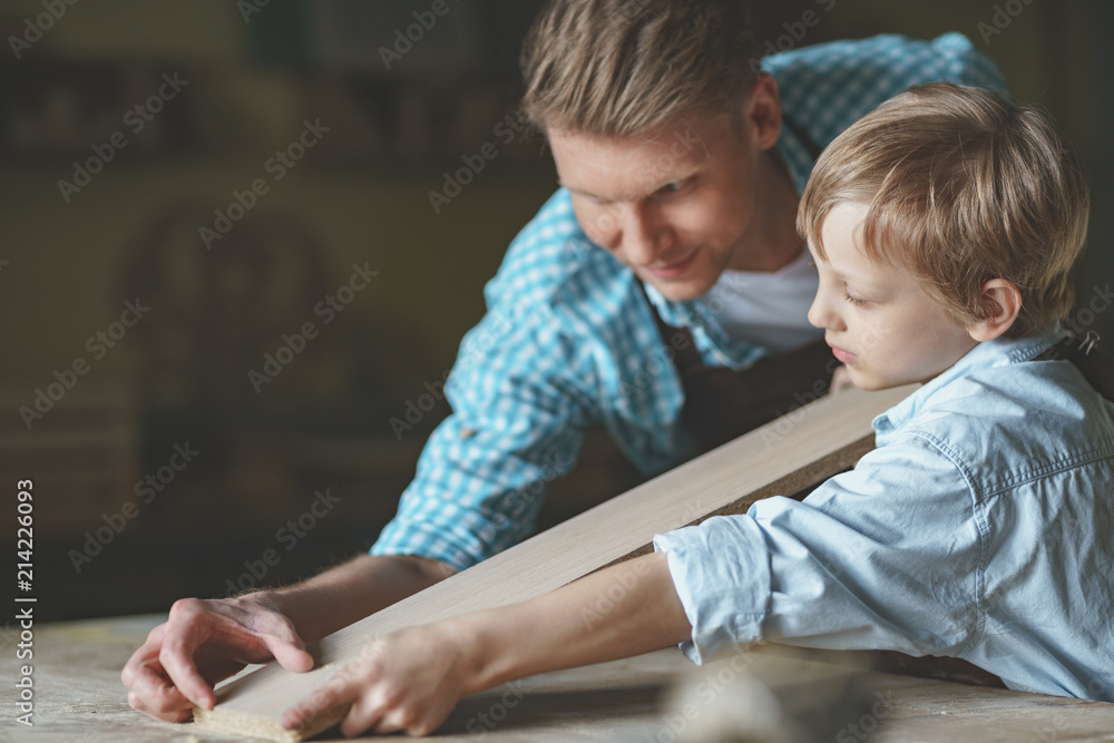 Dad and son at work