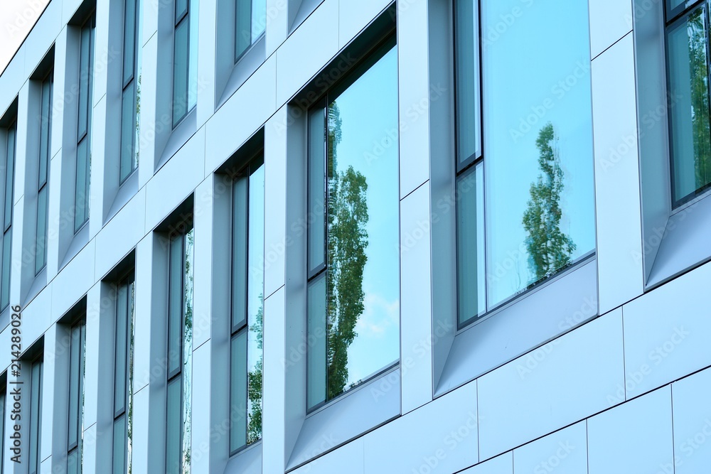 Urban abstract background, detail of modern glass facade, office business building