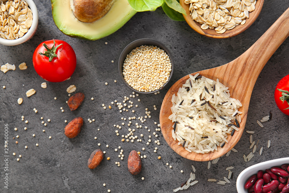 Various healthy products on grey background