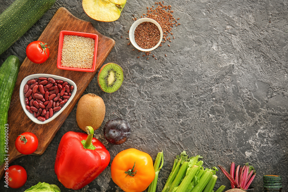 Various healthy products on grey background