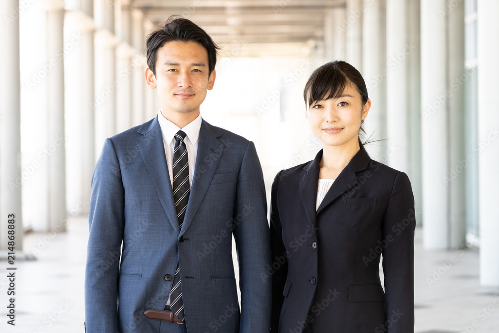 asian business team walking in hallway