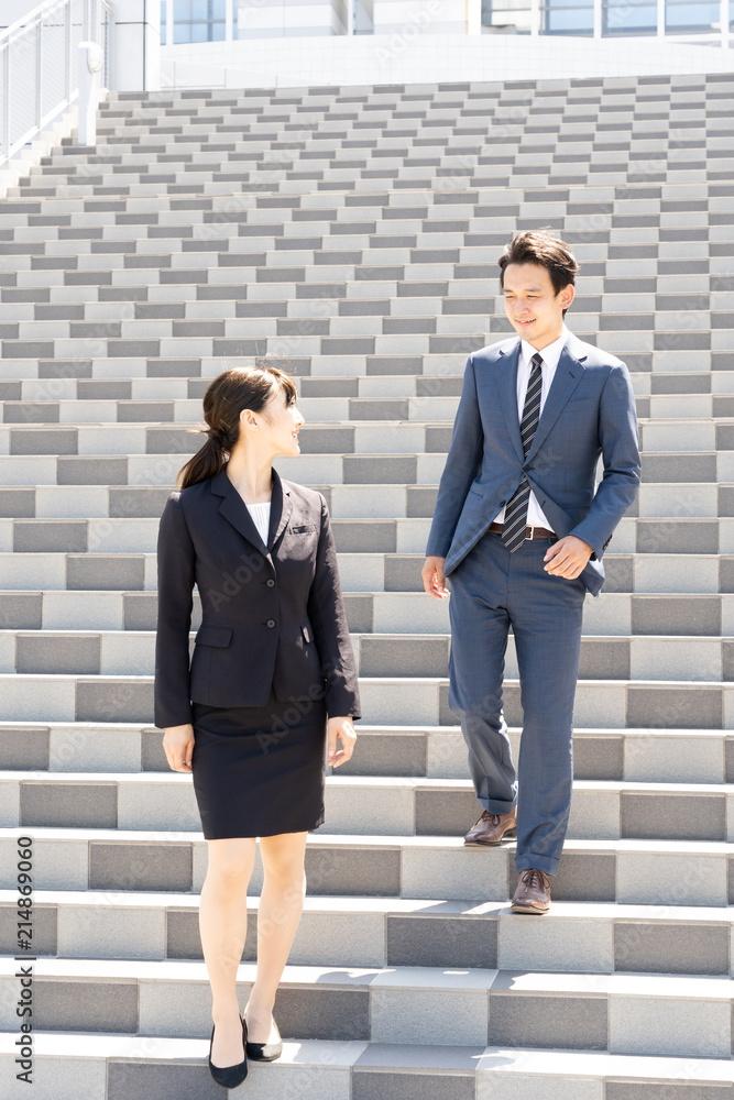 asian business team on stairs