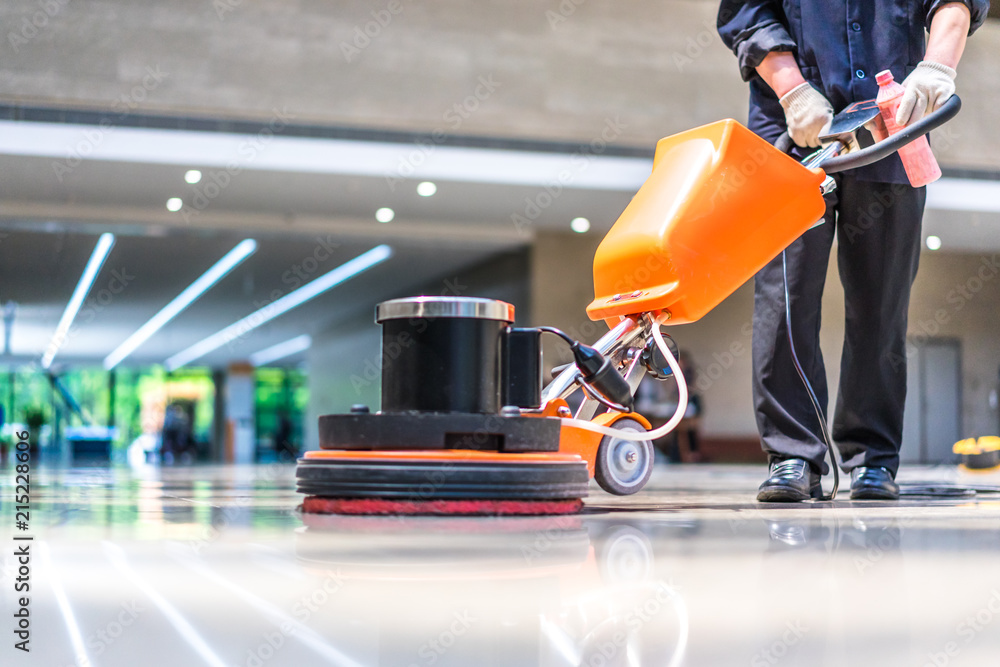 cleaning floor with machine