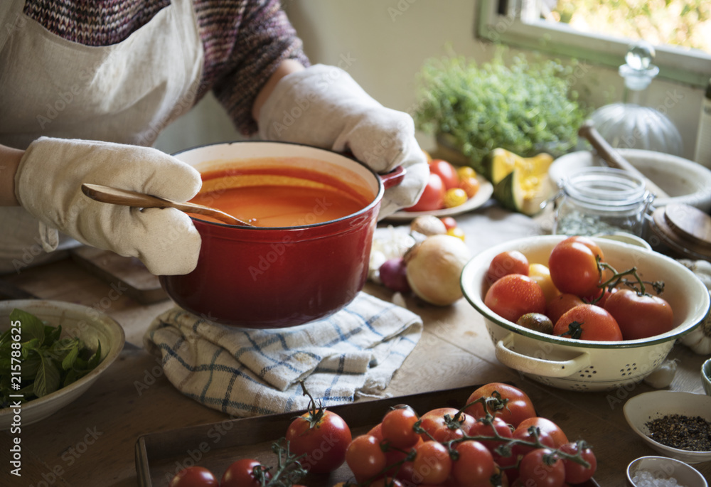 A housewife cooking tomato sauce food photography recipe idea