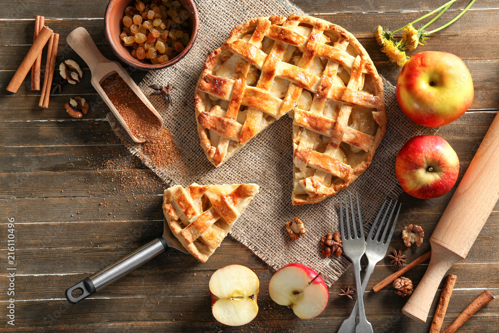 Composition with tasty apple pie on table