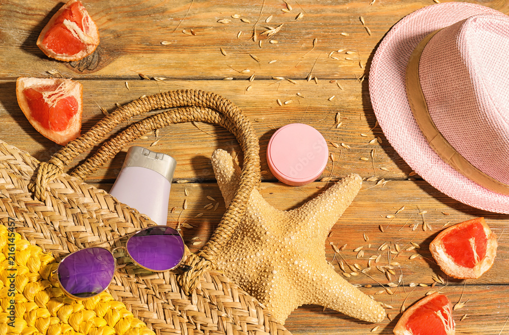 Composition with travel items on wooden background