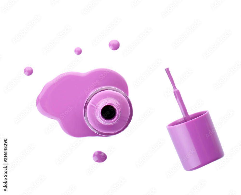 Open bottle of nail polish with brush on white background