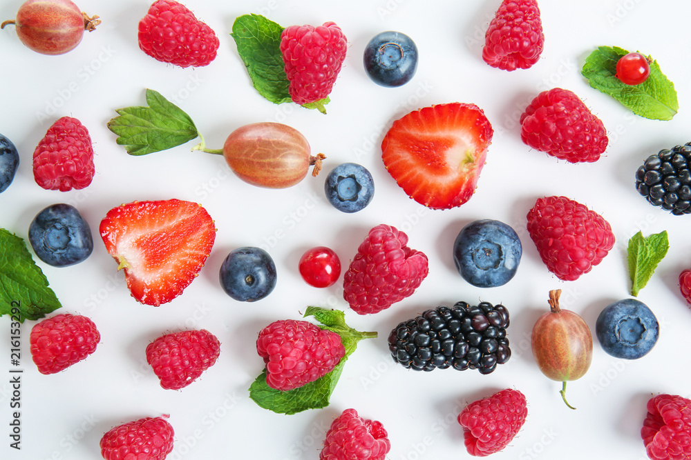 Different ripe berries on white background