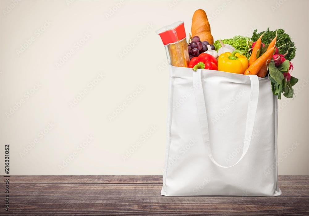 Full shopping  bag on desk